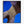 Load image into Gallery viewer, This photo was taken directly below Paris’ legendary Arc de Triomphe, at the centre of Place Charles de Gaulle, standing at the western end of the Champs-Élysées. Looking up, the summer night lends itself to showcase this Neoclassical monument set against the crystal blue night sky.