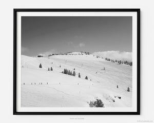 This black and white fine art photography print shows winter in Vail, Colorado at Vail Ski Resort. This view of the Back Bowls from Two Elk Lodge includes ski runs and the Orient Express Ski Lift in the distance.