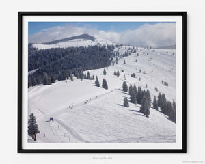 This fine art photography print shows winter in Vail, Colorado at Vail Ski Resort. The wide view of the Back Bowls includes ski runs such as: Sleepy Time Road, Headwall, Yonder Gulley, Yonder, and the Sun Up Express Ski Lift.