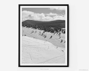 This black and white fine art photography print shows winter in Vail, Colorado at Vail Ski Resort. This view of the Back Bowls from Two Elk Lodge includes ski runs and the Orient Express Ski Lift in the distance.