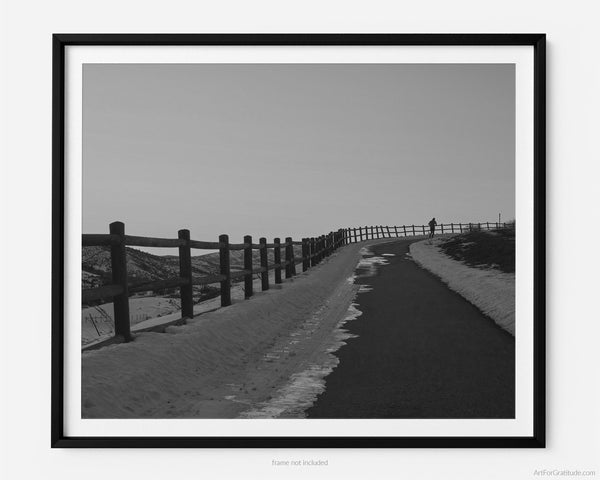 Runner on Winding Road At Sunset