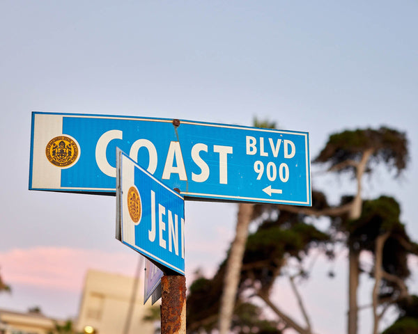 Coast Boulevard Street Sign at Sunset