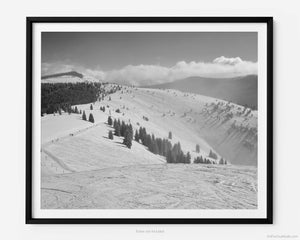 This black and white fine art photography print shows winter in Vail, Colorado at Vail Ski Resort. The wide view of the Back Bowls includes ski runs such as: Sleepy Time Road, Headwall, Yonder Gulley, Yonder, and the Sun Up Express Ski Lift.