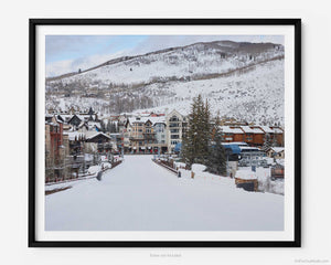  This fine art photography print is of Vail Ski Resort in Vail, Colorado. This image captures the majestic beauty of Lionshead Village during the winter ski season, showcasing the town's picturesque charm and natural splendor.