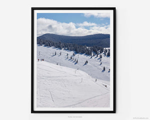 This fine art photography print shows winter in Vail, Colorado at Vail Ski Resort. This view of the Back Bowls from Two Elk Lodge includes ski runs and the Orient Express Ski Lift in the distance.