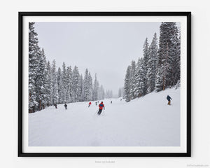 This fine art photography print shows winter in Vail, Colorado at Vail Ski Resort. Capturing the thrill of skiing down the Flapjack run, this print showcases fresh powder, snow dusted pine trees, and the winding trail that weaves its way through the trees.