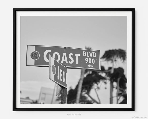 Coast Boulevard Street Sign at Sunset